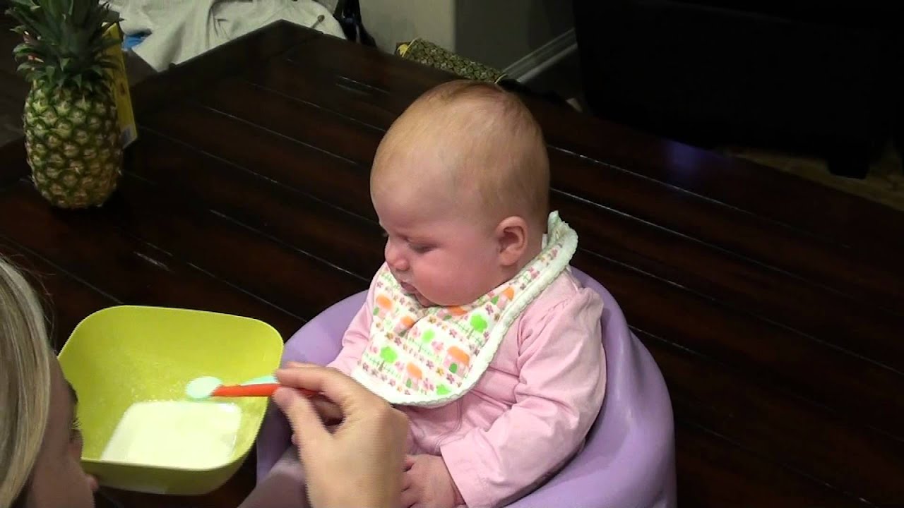 Hailey's first bites of rice cereal