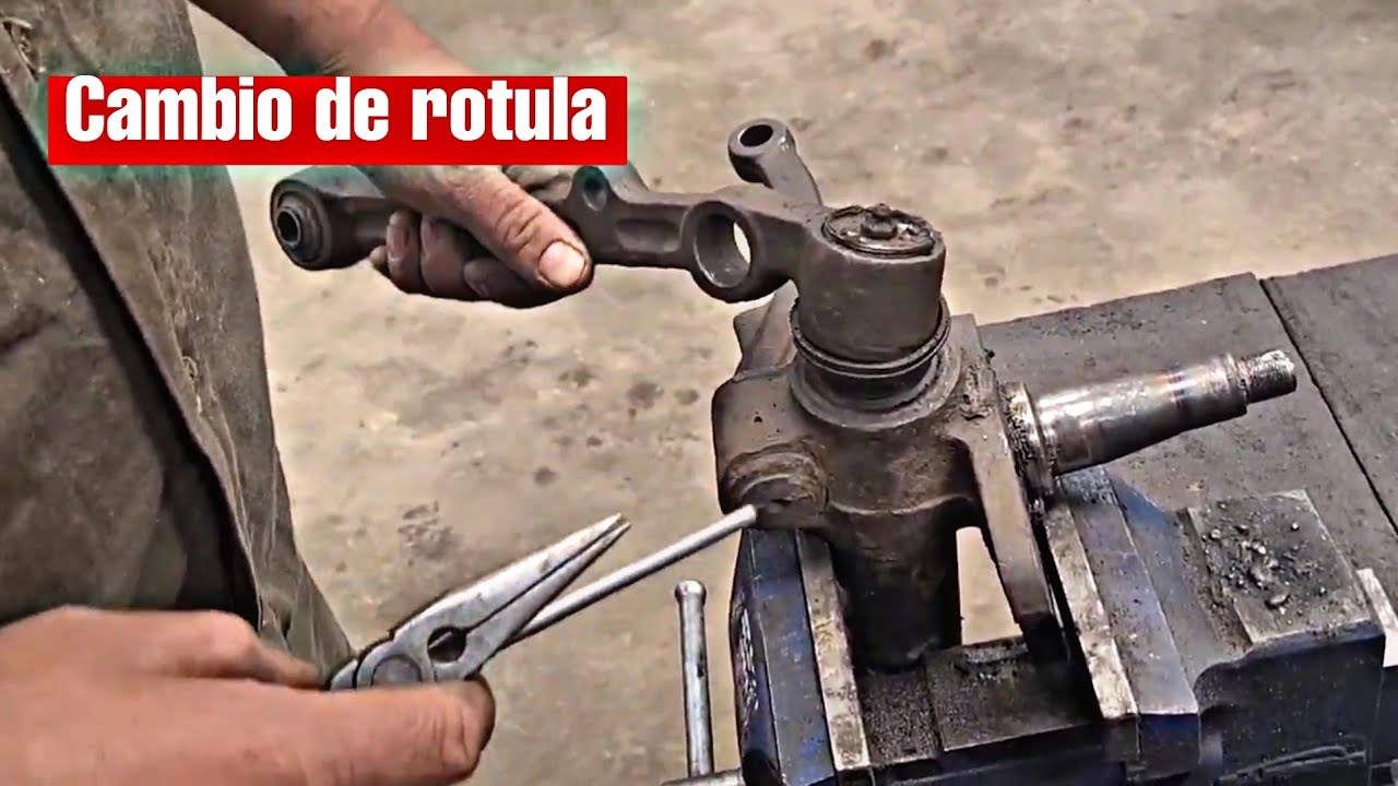 Reparación de rótula de peugeot 504 modelo viejo