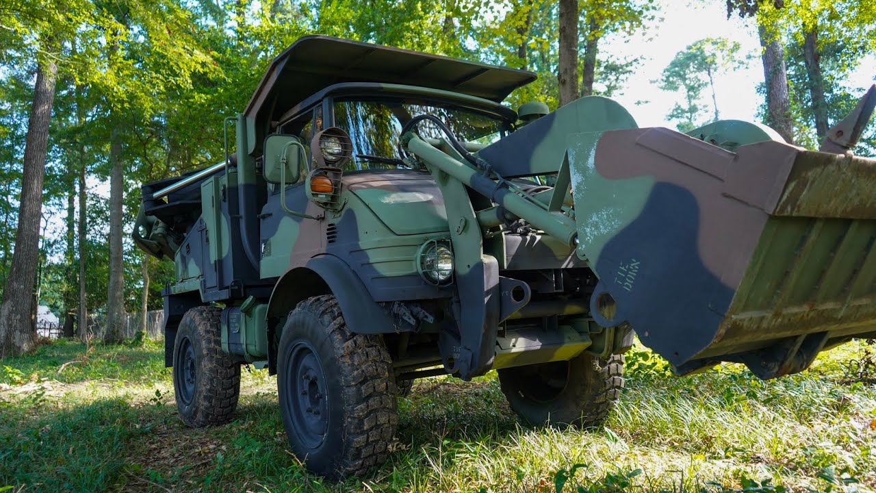 Freightliner Unimog FLU-419 SEE Tractor Startup / Digging Operation