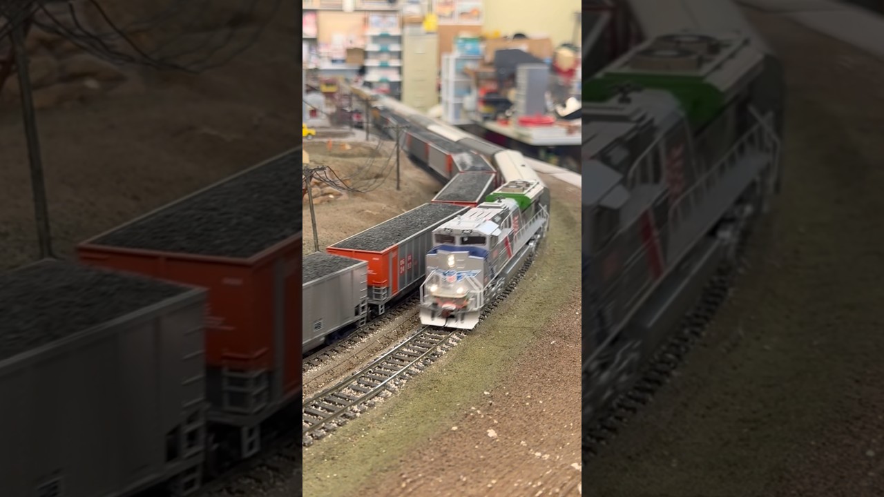 UP1943 Spirit of the Union Pacific￼ passes a slow moving coal train! HO scale model railroad￼