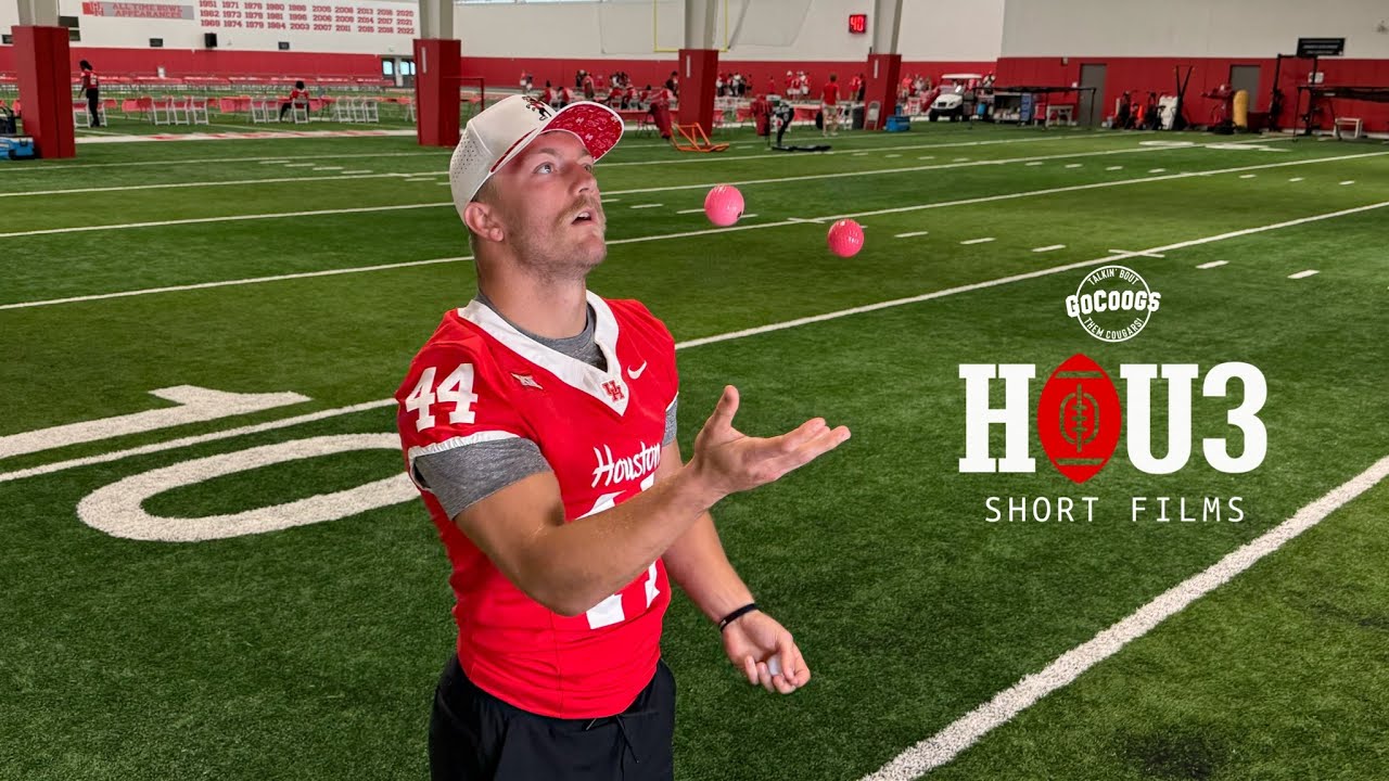 Dean Connors juggling while answering questions