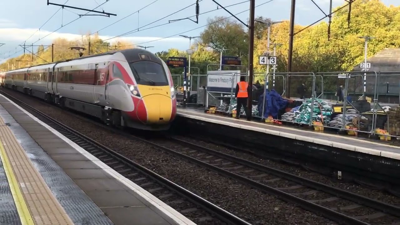 Class 801 Azuma passes Finsbury Park (with horn)