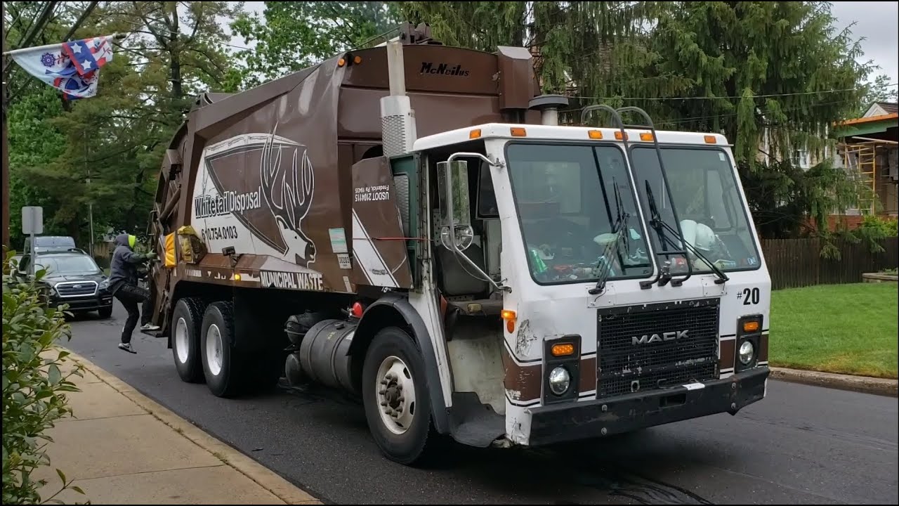 Whitetail Disposal Mack LE McNeilus rear loader garbage truck