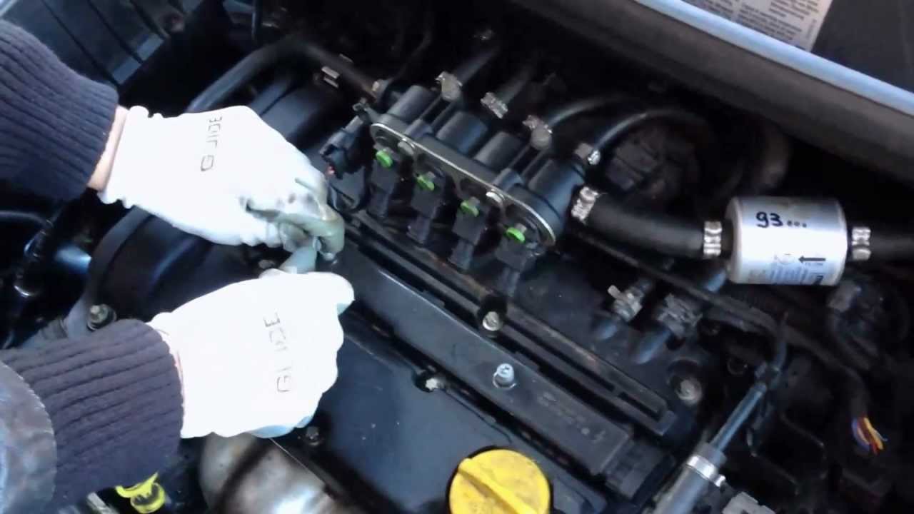 Sostituzione candele Opel Corsa D 1.2 benzina anno 2008