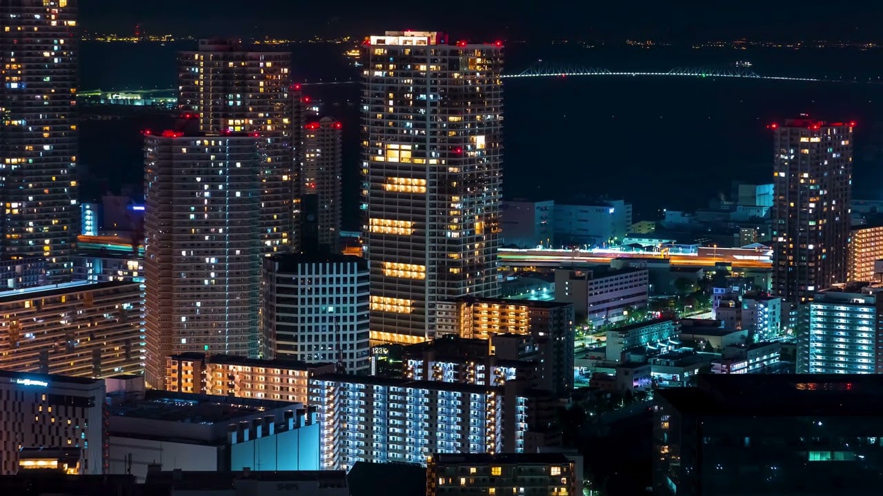 VideoVault Stock Video: Tokyo Japan high-rise apartment building at night time-lapse