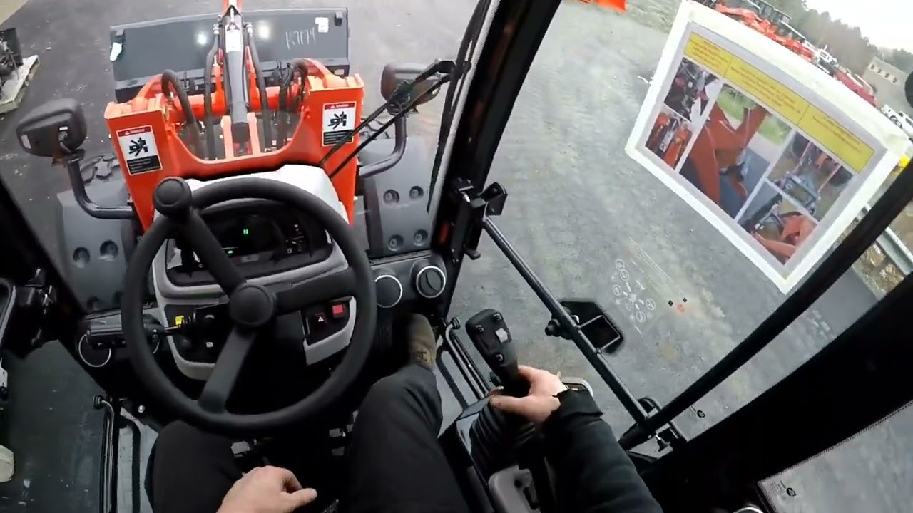 attaching a bucket on a Kubota R640