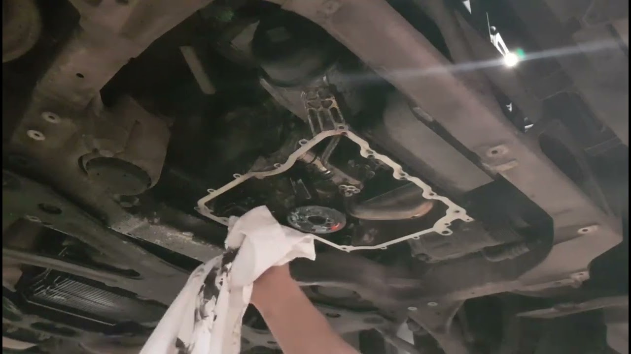 Porsche Panamera 4S 2013 oil change and oil pan gasket.