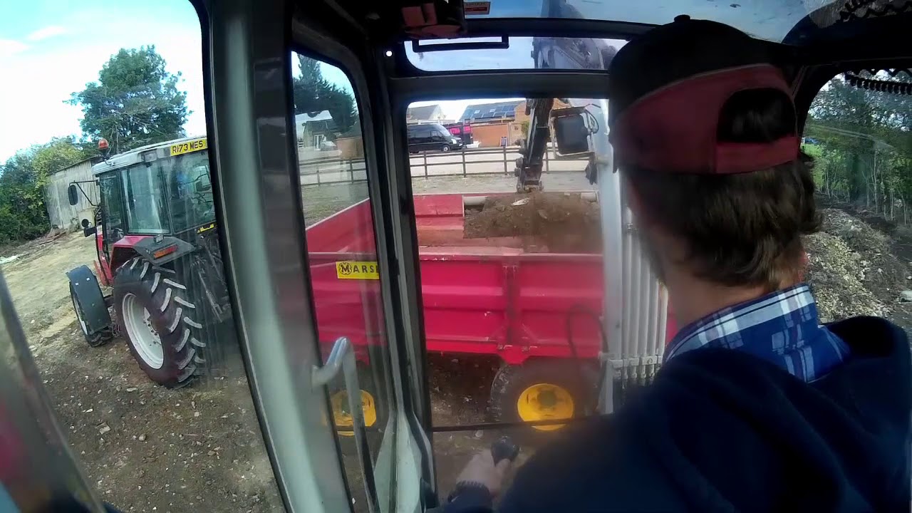 Takeuchi Tb125 digging up hard-standing