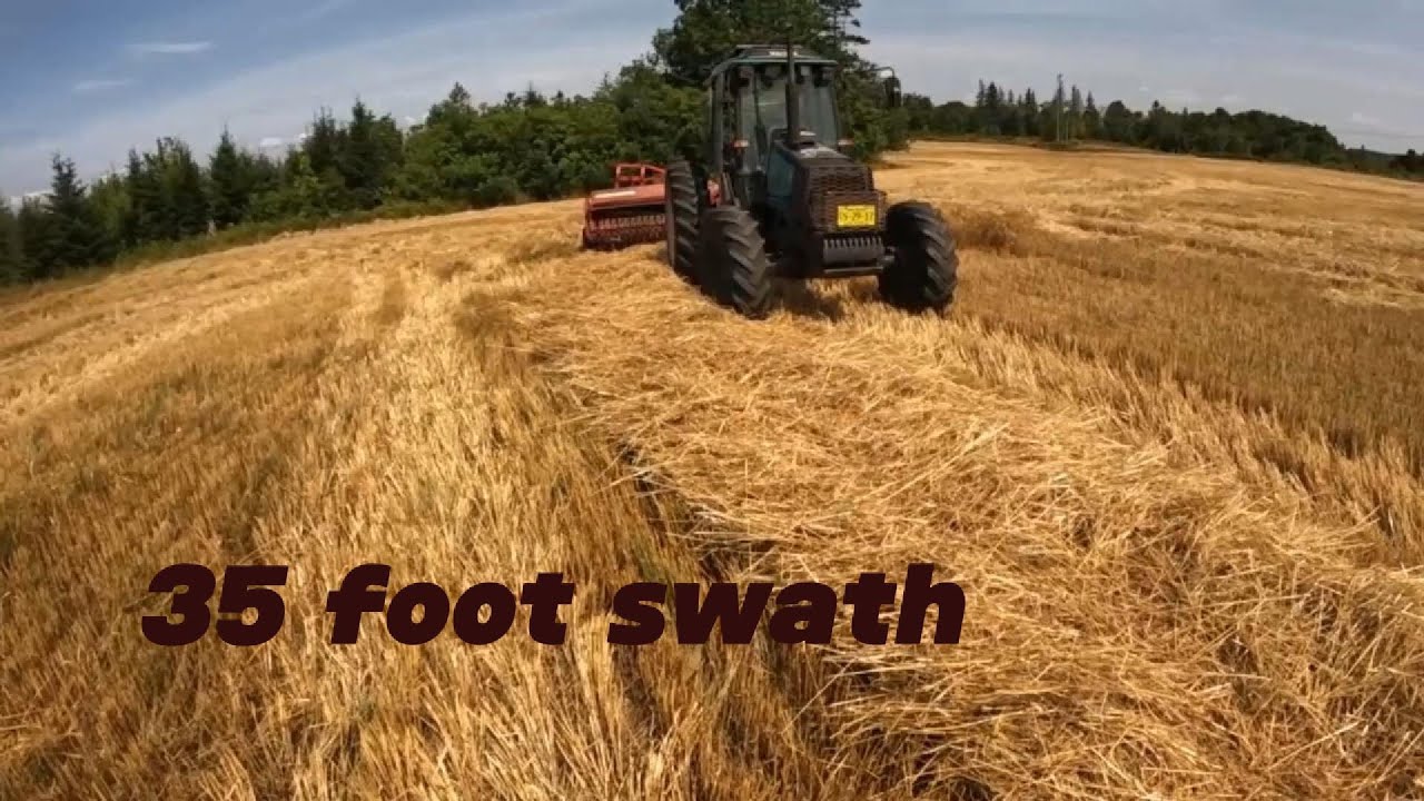 Old baler vs 35 feet of straw...making square bale straw