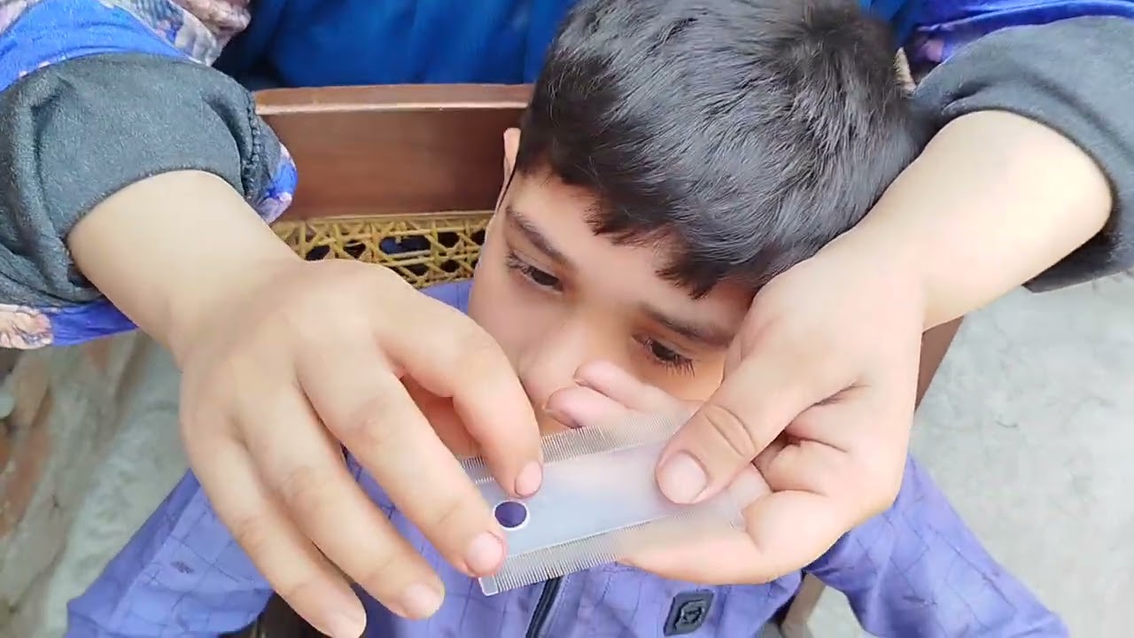 Hair checking of Hanan by mom.