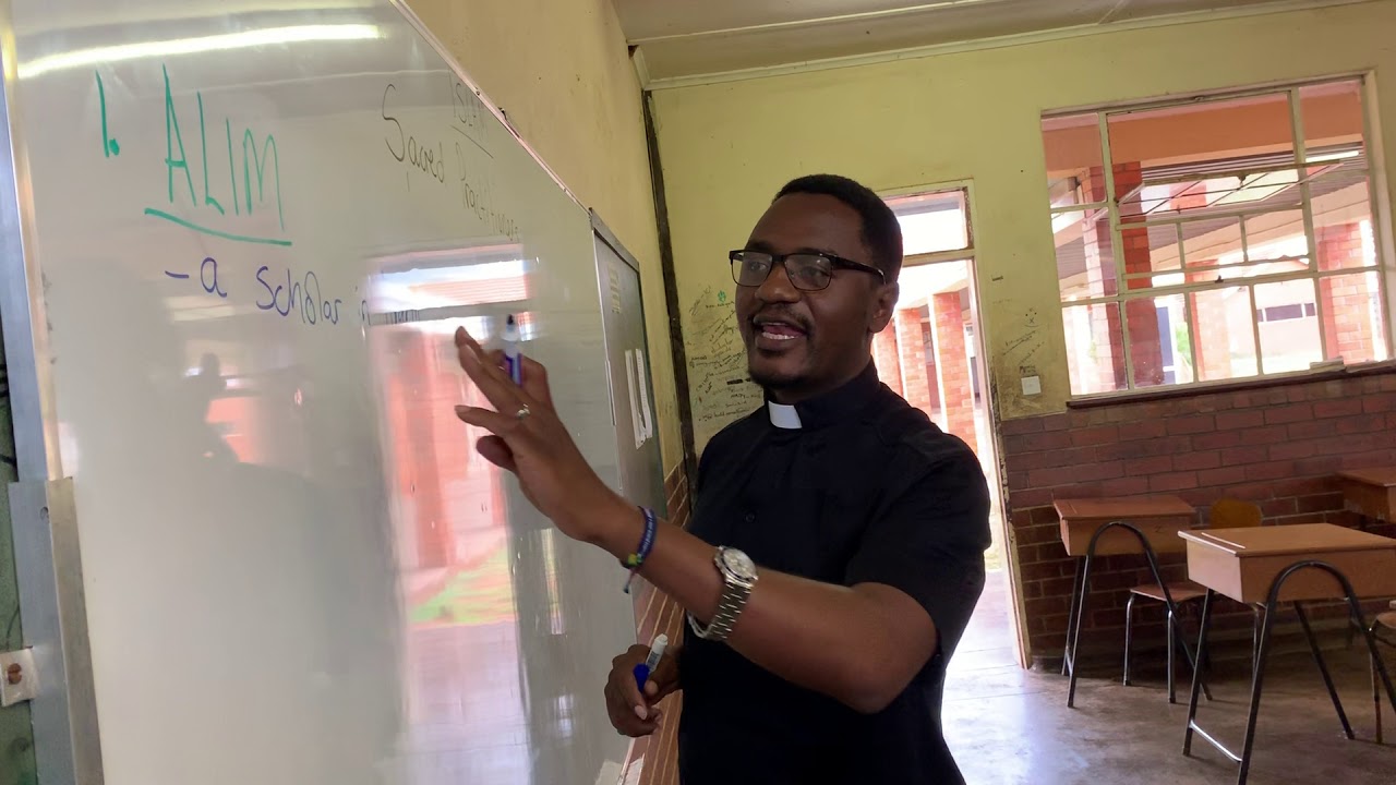 Fr Padya Sj teaching FRS at St Ignatius College Zimbabwe