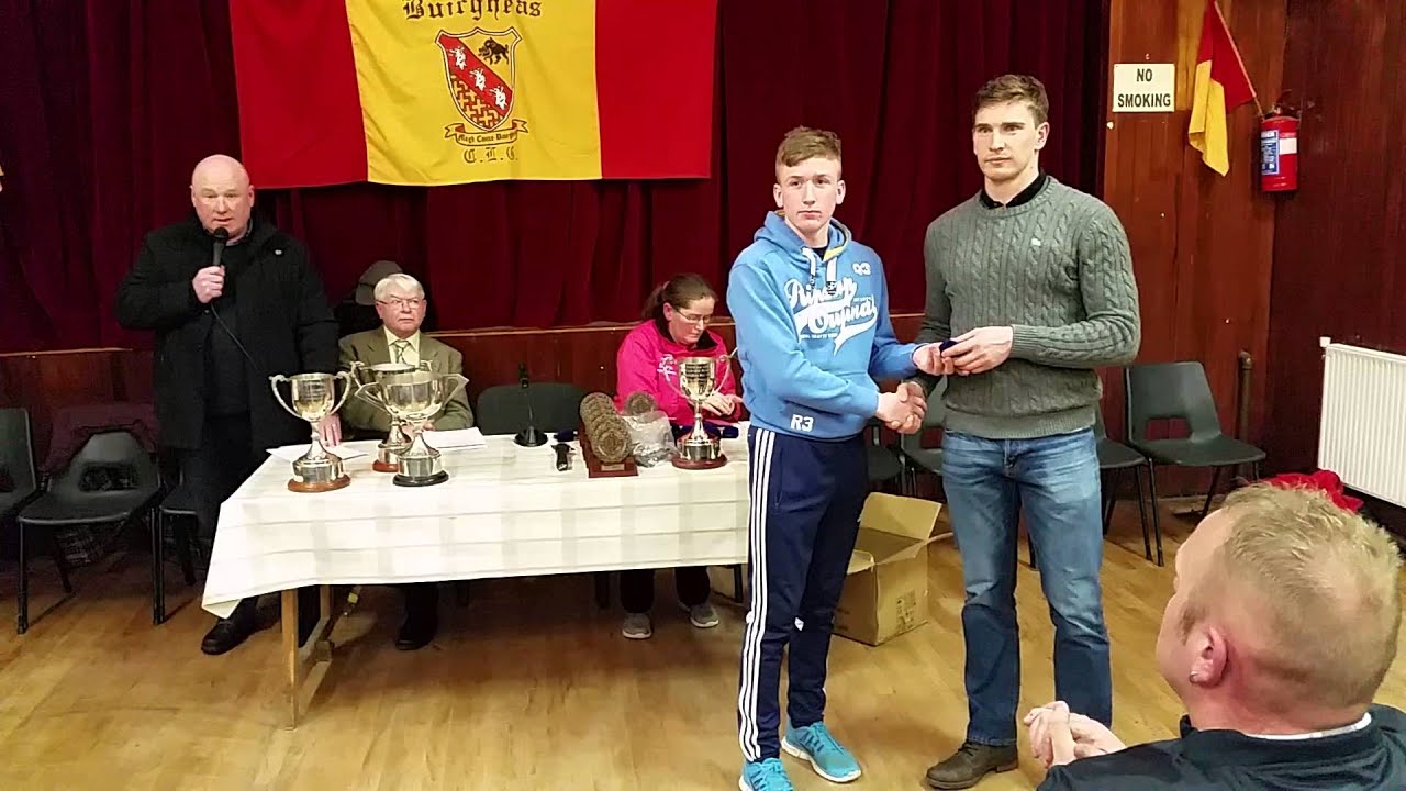 Tipp Captain Brendan Maher presents medals to Moycarkey Borris GAA U16's