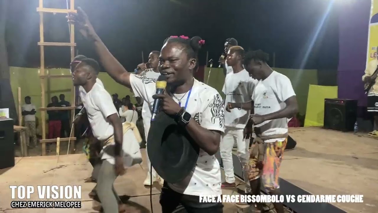 Лицом к лицу Биссомболо и Жандарм Куше на ярмарке Муйондзи