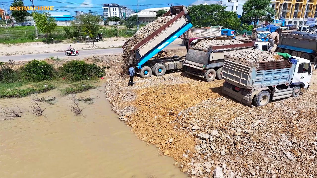 Update Amazing project shows the Land Filling Up Dozer Komatsu DR-51-PX Pushing stone Into the Water