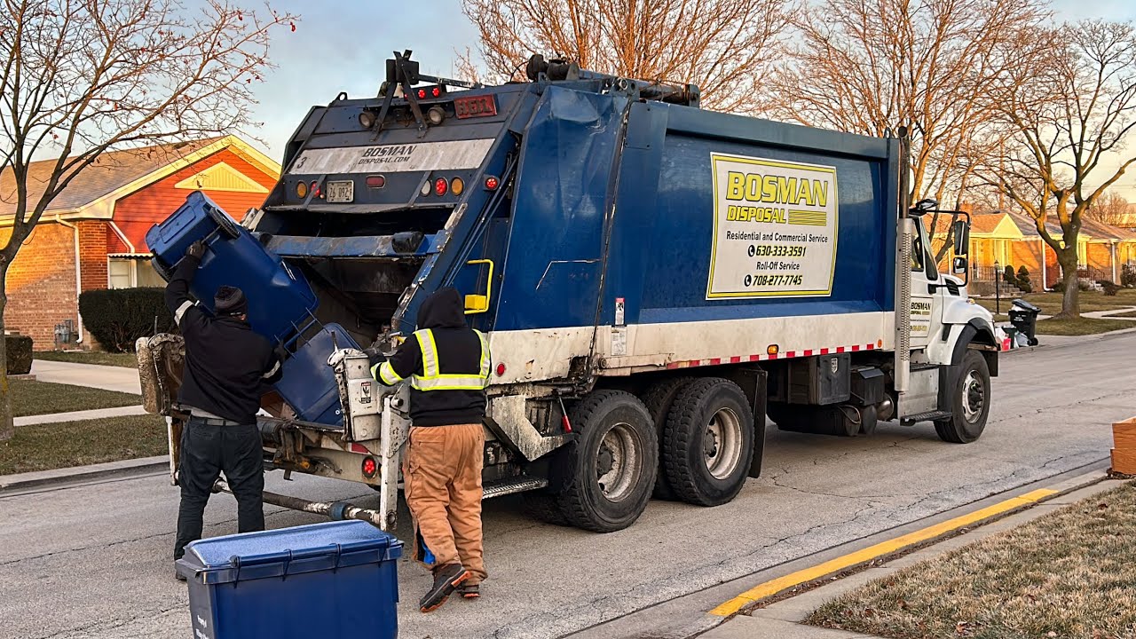 Bosman Disposal Heil Rear Loader Flying Through a Recycling Route