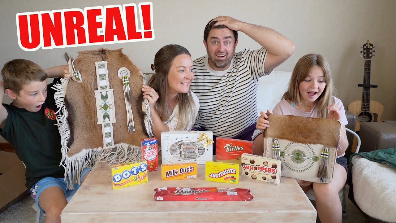 New Zealand Family Receives NATIVE AMERICAN gifts and Tries MILK DUDS & MOUNDS for the first time!