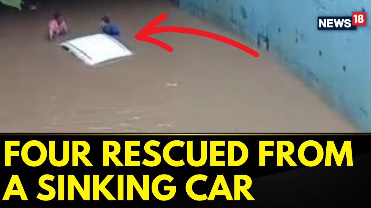 Gujarat Rain News | Four People Saved By Firefighters From A Car Stuck In Flood | News18