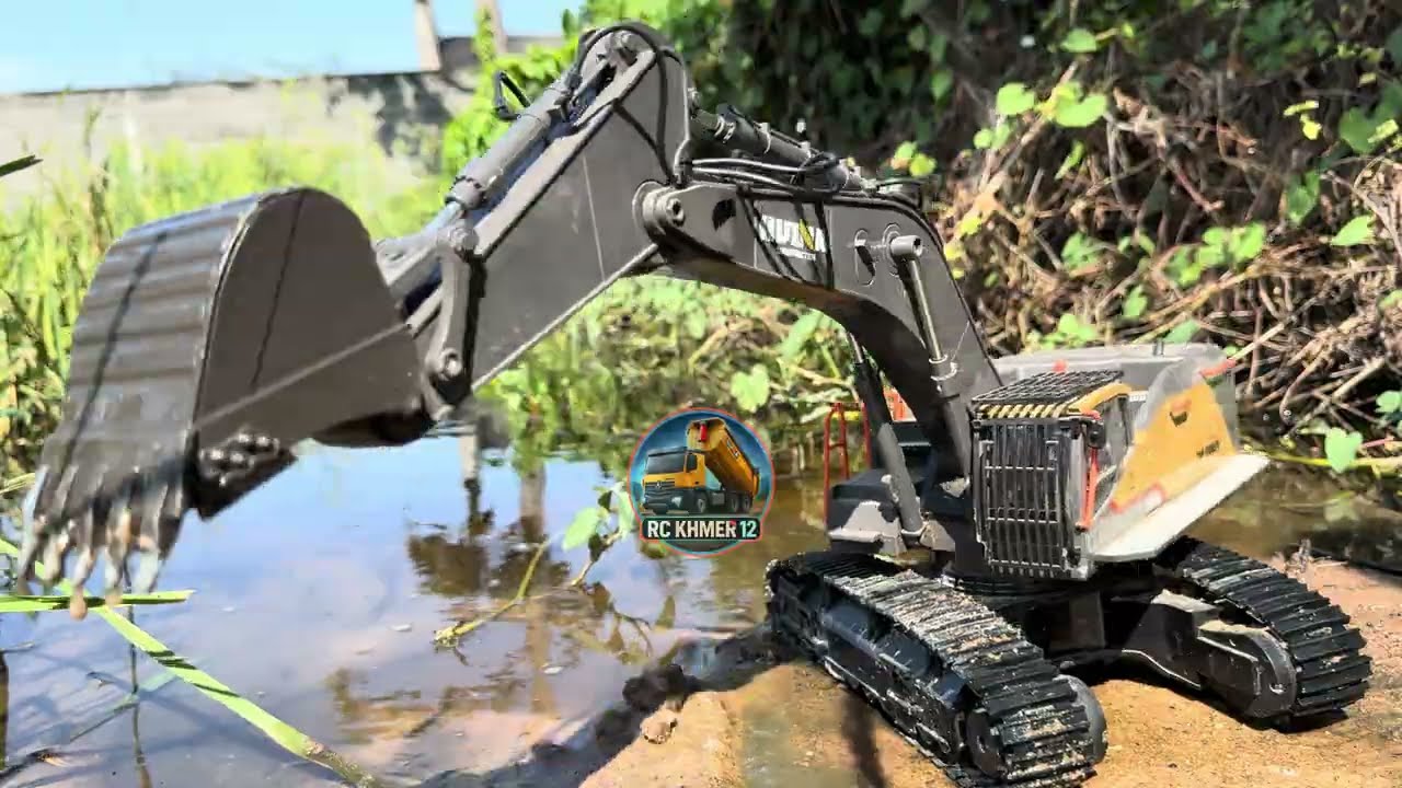 Huina 1592 Excavator Digging Soil Near Rice Field With Water – Beautiful Countryside Scenery 🌾🚜