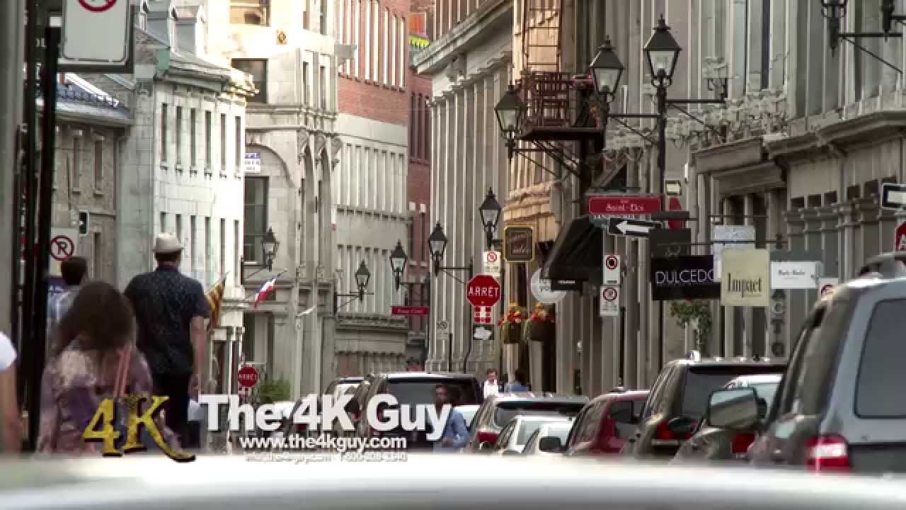 4K UHD 60fps - People walking in old european streets with bricks and stone walls