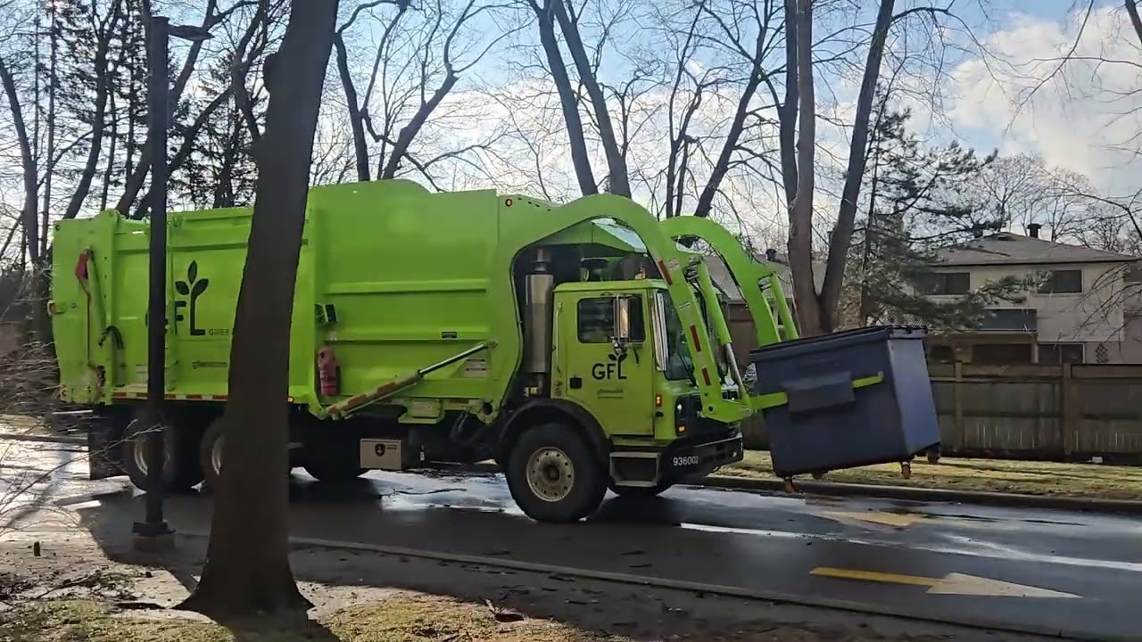 GFL Environmental Recycling Truck emptying recycling bins