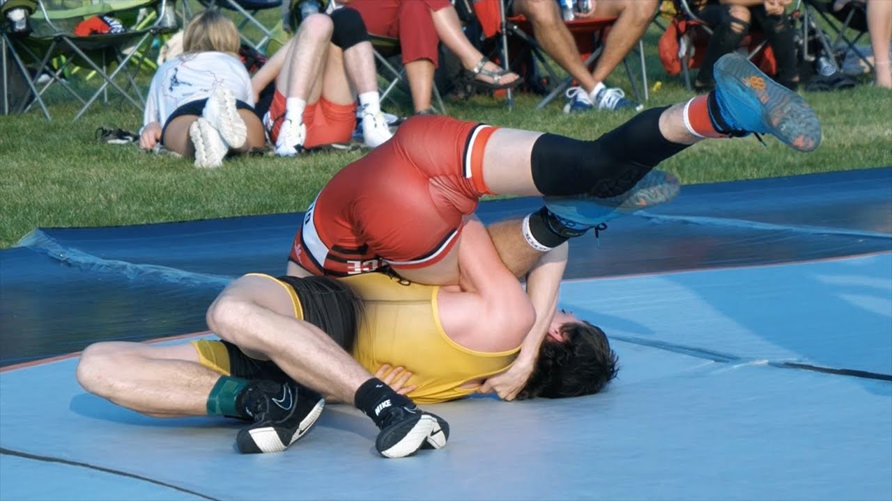 Isaiah Giron of Racine Case High School [G] v. Evan Glowinski of Team Tortorice [R] (115)