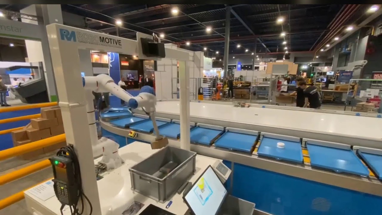 Robomotive Item pick from tote to sorter on Logistica 2019