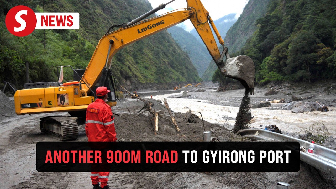 Nepal and China flood: Rescuers clear last stretch of cut-off road at Gyirong port