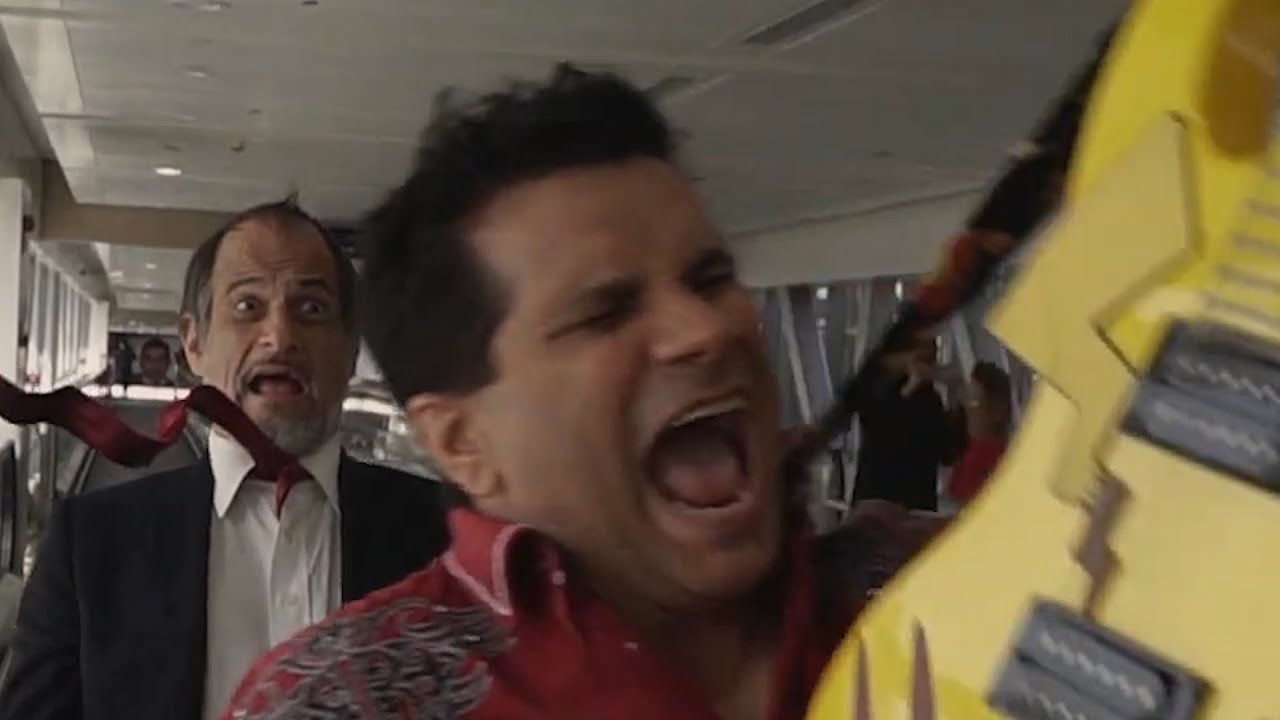 Tommy Tallarico miming along to someone else's guitar track in Dubai for some reason