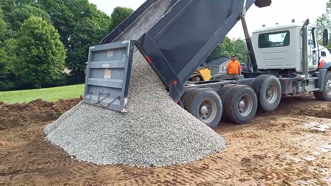 dump truck unloading rocks