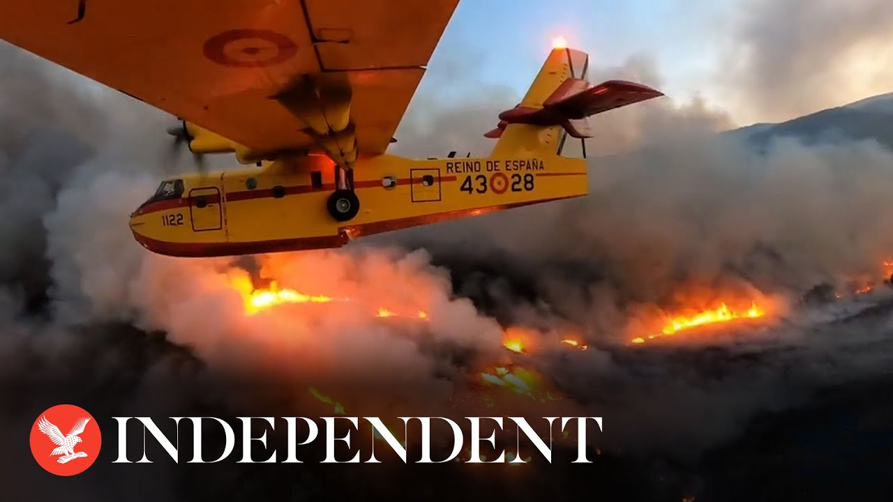Firefighting planes fly through Tenerife wildfire as blaze burns on island