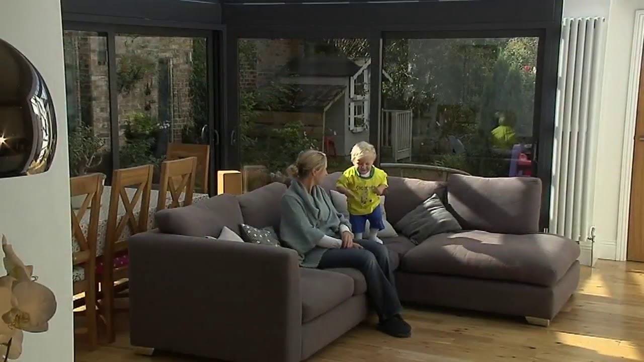Glass conservatory with Gliding Doors