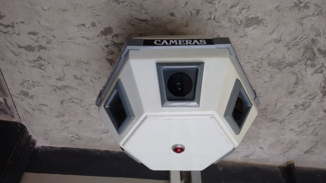 Inside a big scary rotating CCTV camera.