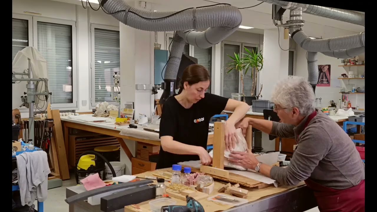 Restauration d'un bras en plâtre