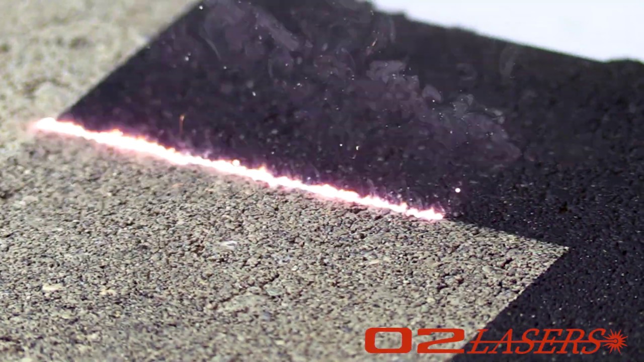 Cleaning Spray Paint Off Of Grey Concrete -- Laser Cleaning
