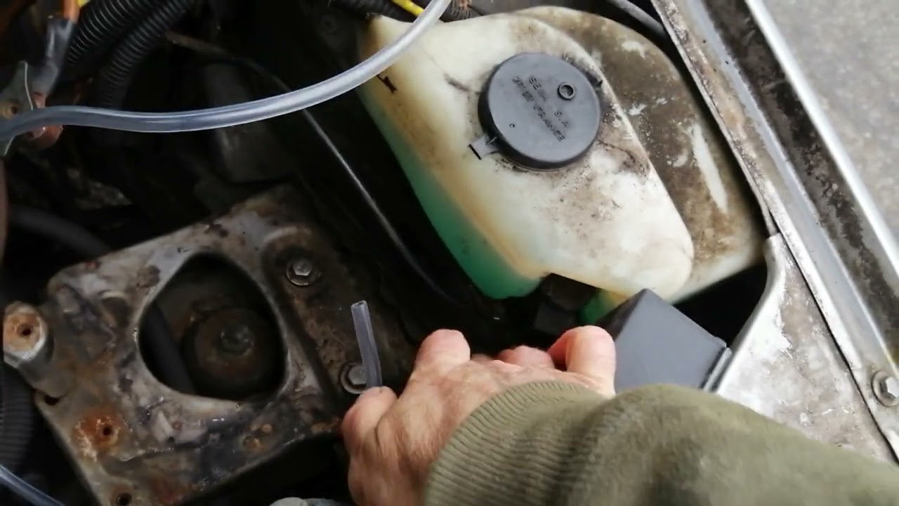 Peugeot 205 : changement conduite lave glace.