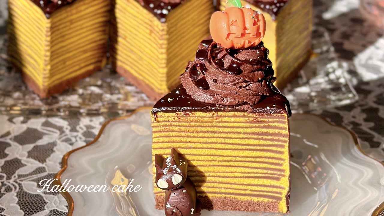 ꒰ハロウィンケーキ🎃꒱かぼちゃミルクレープをチョコでツヤツヤに🍰✨🍫👻