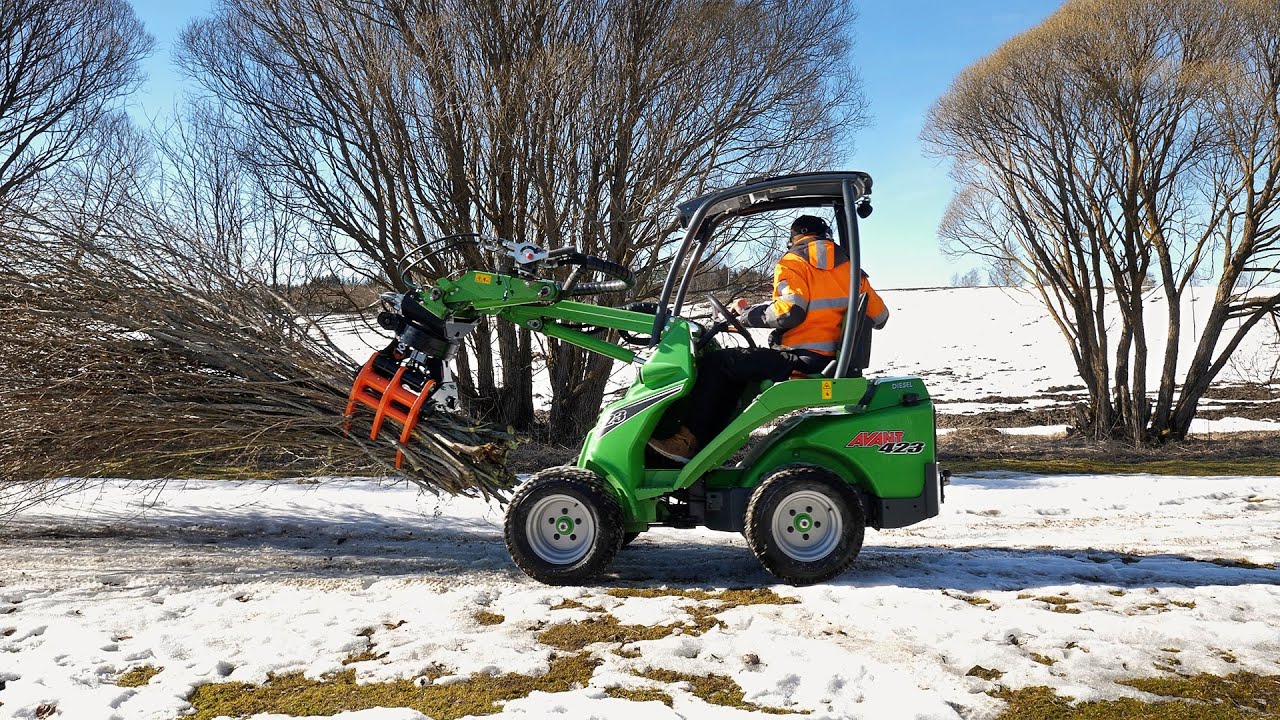 KXZ210 Rotating Tree Shear on a Compact Loader