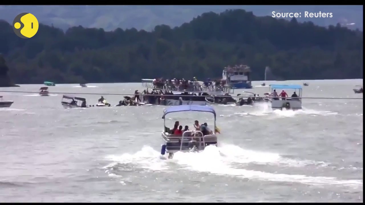 Colombia: Motorboats come to the rescue as 4-storey boat sinks