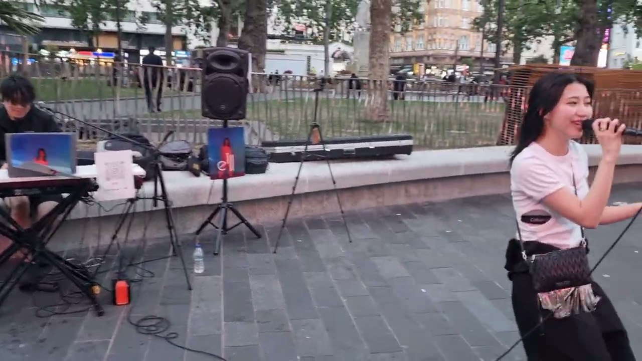 Eill perform Koko de iki wo shite (Tokyo Revengers end them) in Leicester Square 6 July 2023