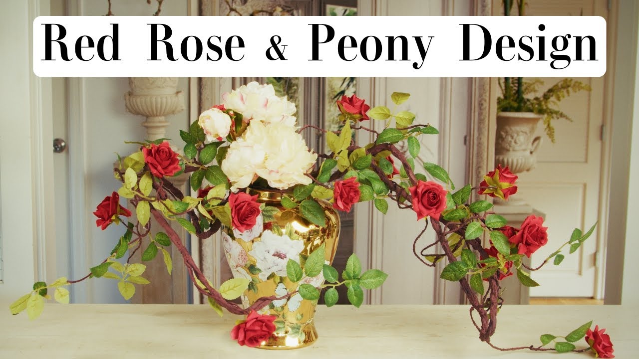 East Meets West Floral Design: A Fusion of Red Roses & Peonies in a Golden Urn