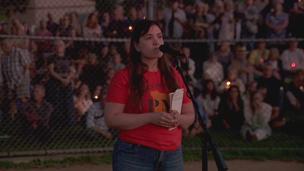 Protect Minnesota Executive Director Maggie Emery speaks at Annunciation shootings vigil