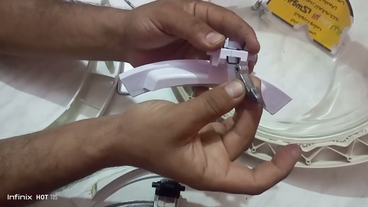 تغير مقبض باب الغساله