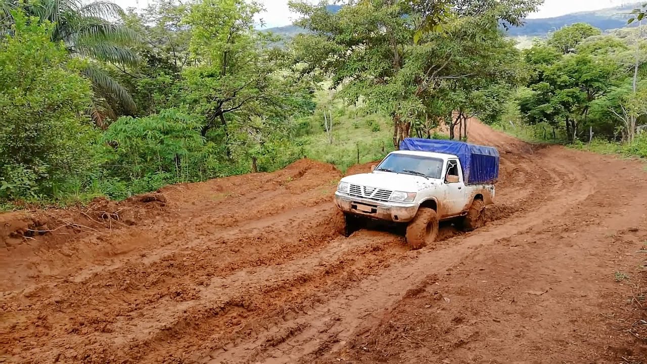 Nissan Patrol | Toyota Land Cruiser 70 Series and Toyota Hilux On Mud Climb Route