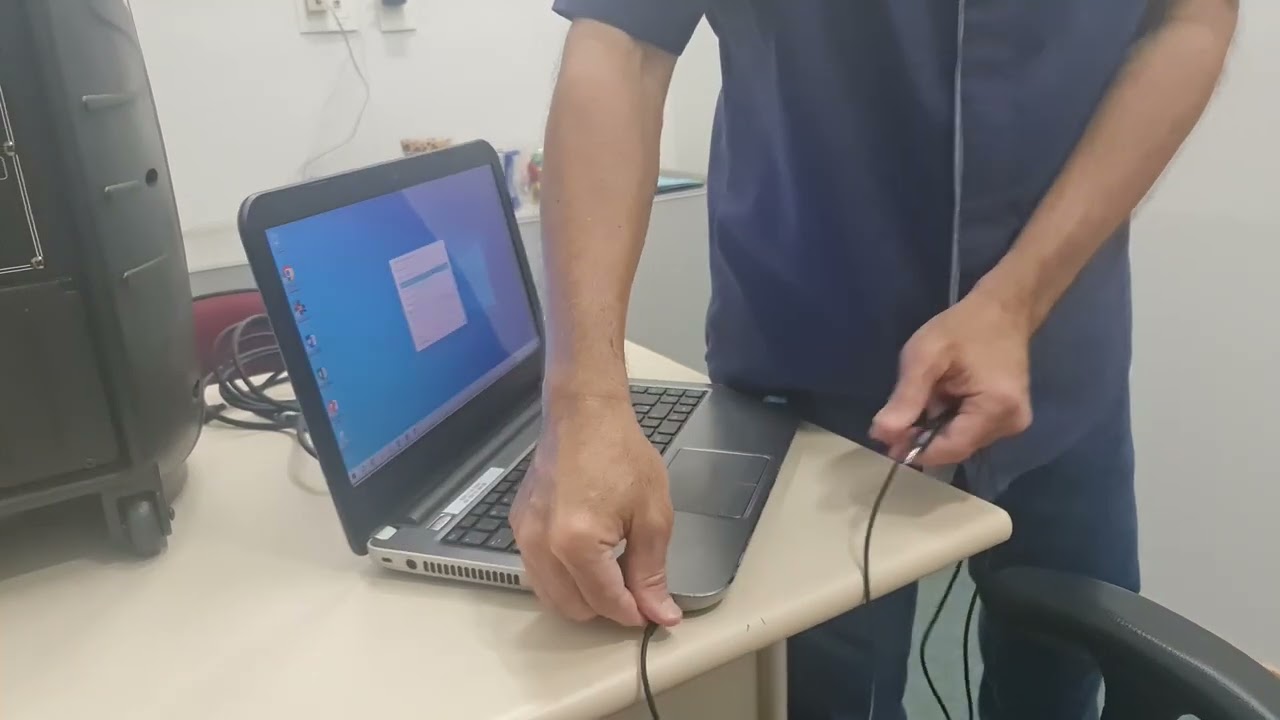 Como ligar uma caixa de som ao notebook por cabo