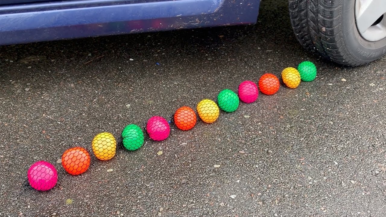 10 SQUISHY STRESS BALLS vs CAR