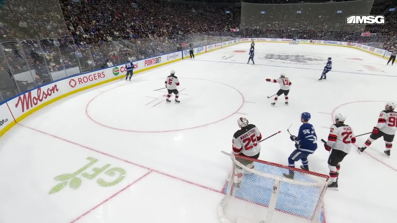 Nicolas Roy scores a goal against the New Jersey Devils