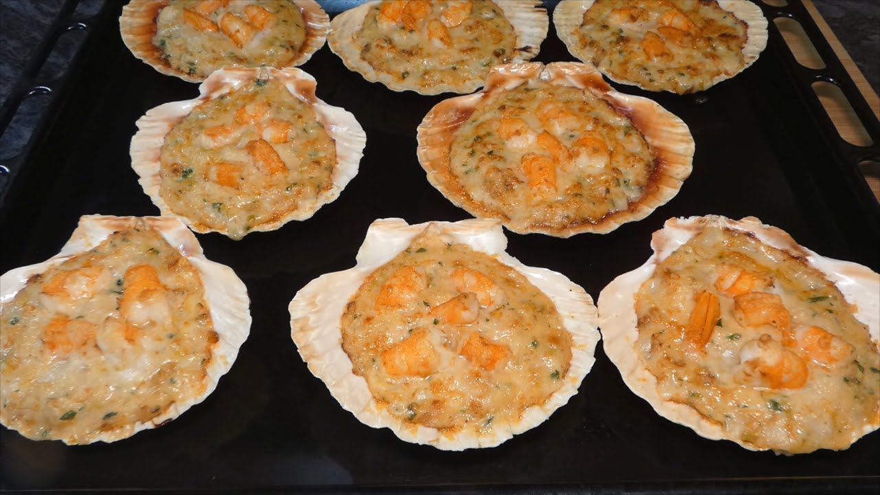 Conchas de Vieira rellenas de merluza y langostinos