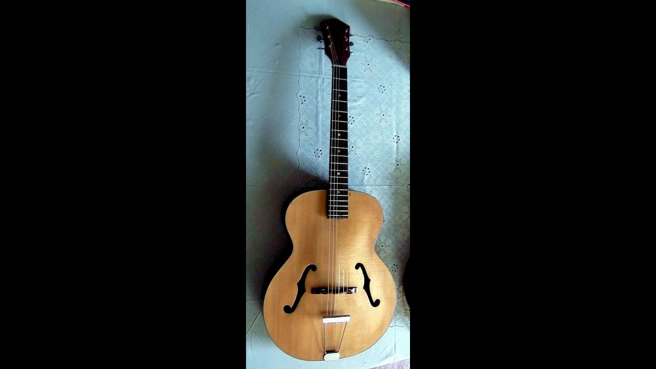 Playing my Harmony Patrician f-hole arched top 50s guitar.