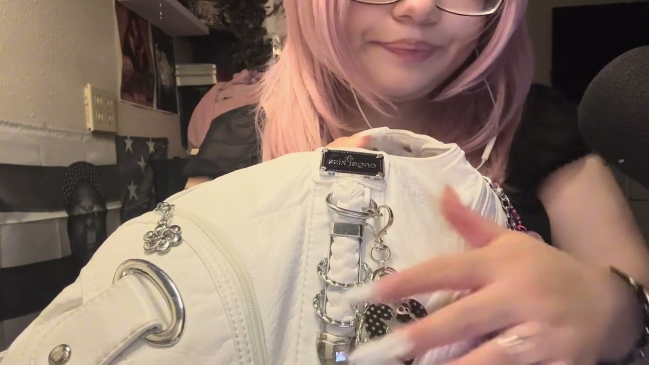 ASMR showing you what’s in my purse 
