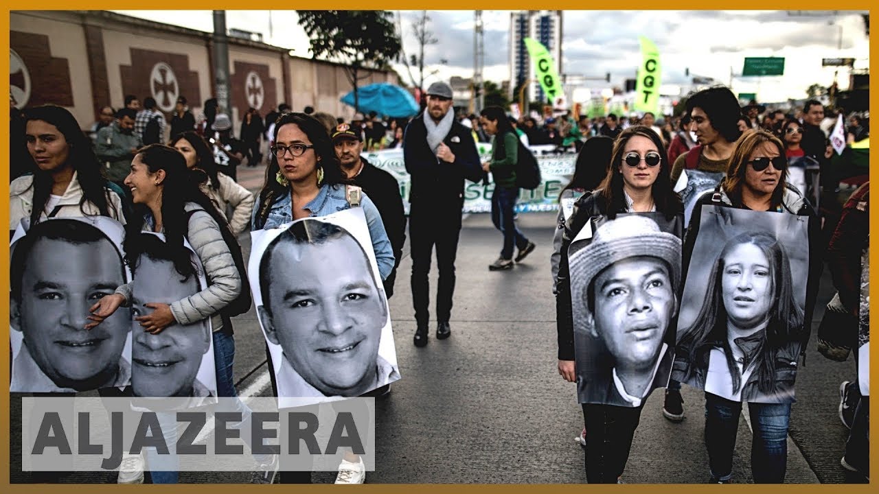 Colombians march to protest against killing of activists